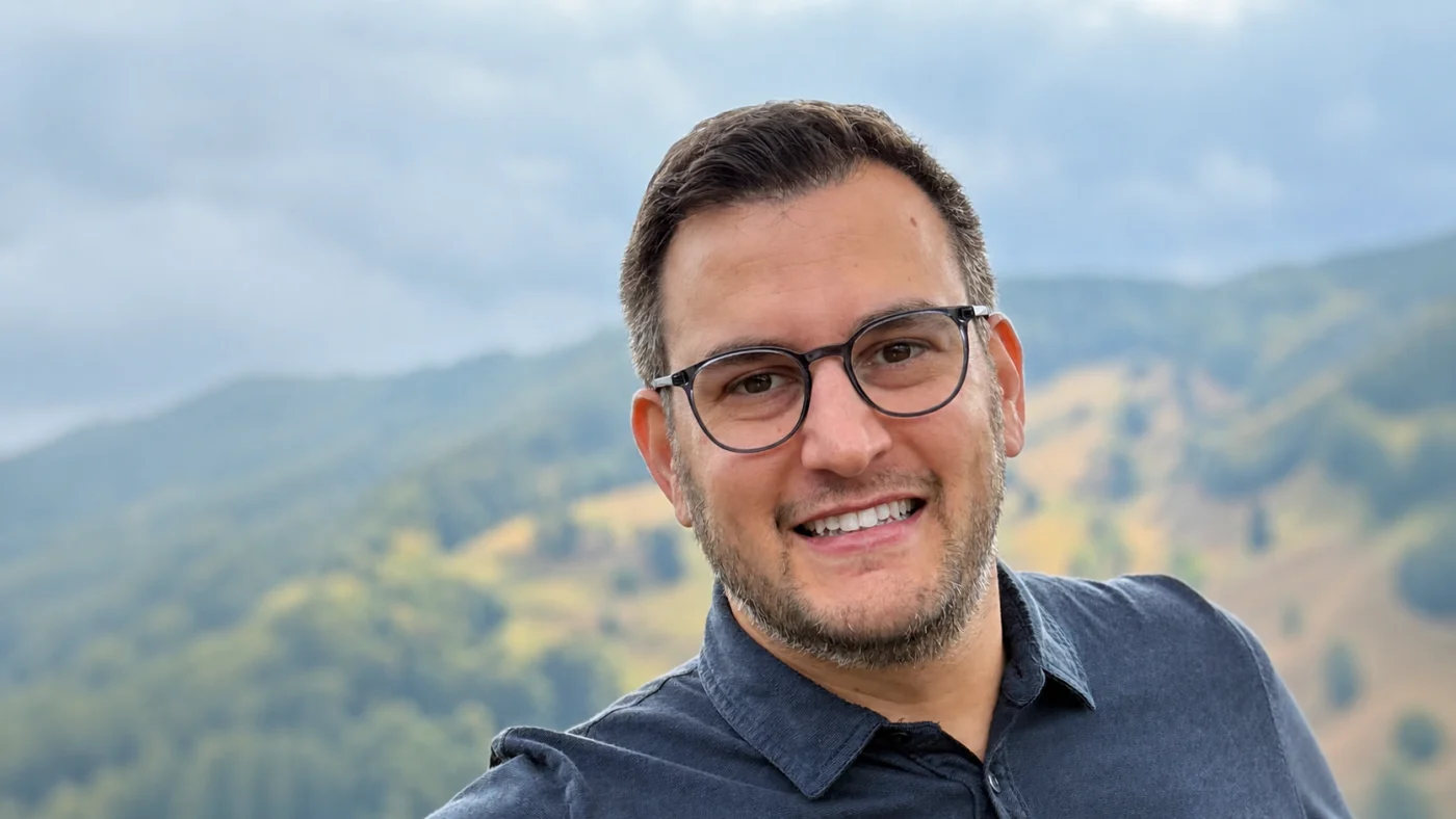 Gilad Moyal, founder of Wand Referrals, smiling outdoors